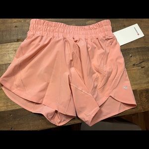 Brand new Lululemon with tags track that shirt 5” size 6